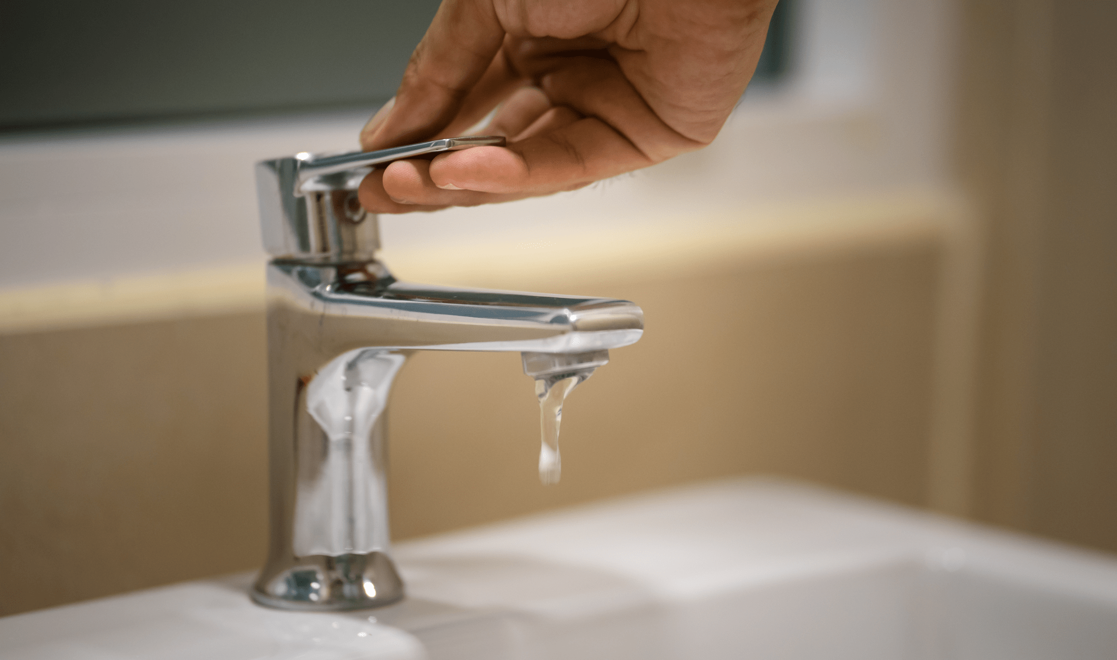 A faucet dripping water.