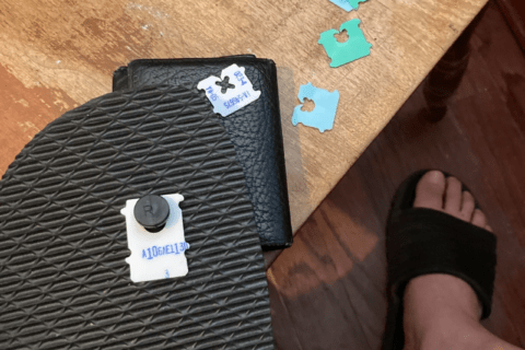 Bread clip on bottom of flip flop.